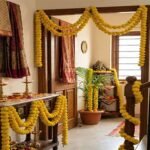 Traditional artificial marigold garland decoration with yellow flower strands used for festival and wedding décor