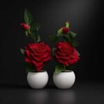 Decorative artificial rose plant for home décor with red roses in white ceramic pot