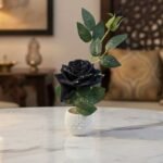 Artificial black rose plant set of 2 in decorative white pots for table and home decor.